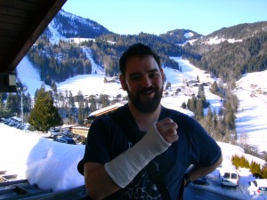 JTA on a balcony with his arm in a cast